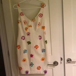 Colorful V neck dress with crystal embellishments.